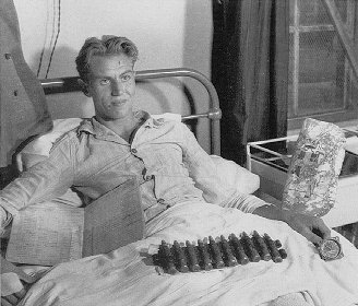 George Beurling in hospital after surviving the crash of a B-24 off Gibraltar
