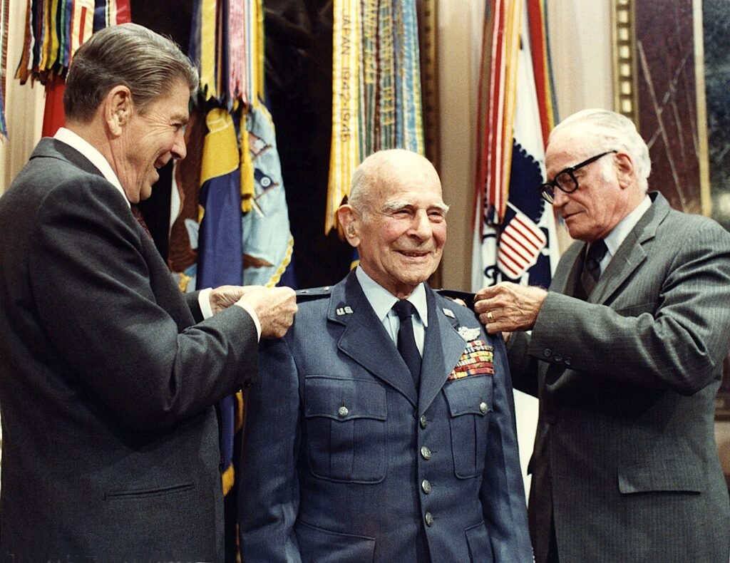 President Reagan and Senator Goldwater pin a fourth star on Jimmy Doolittle, 1985