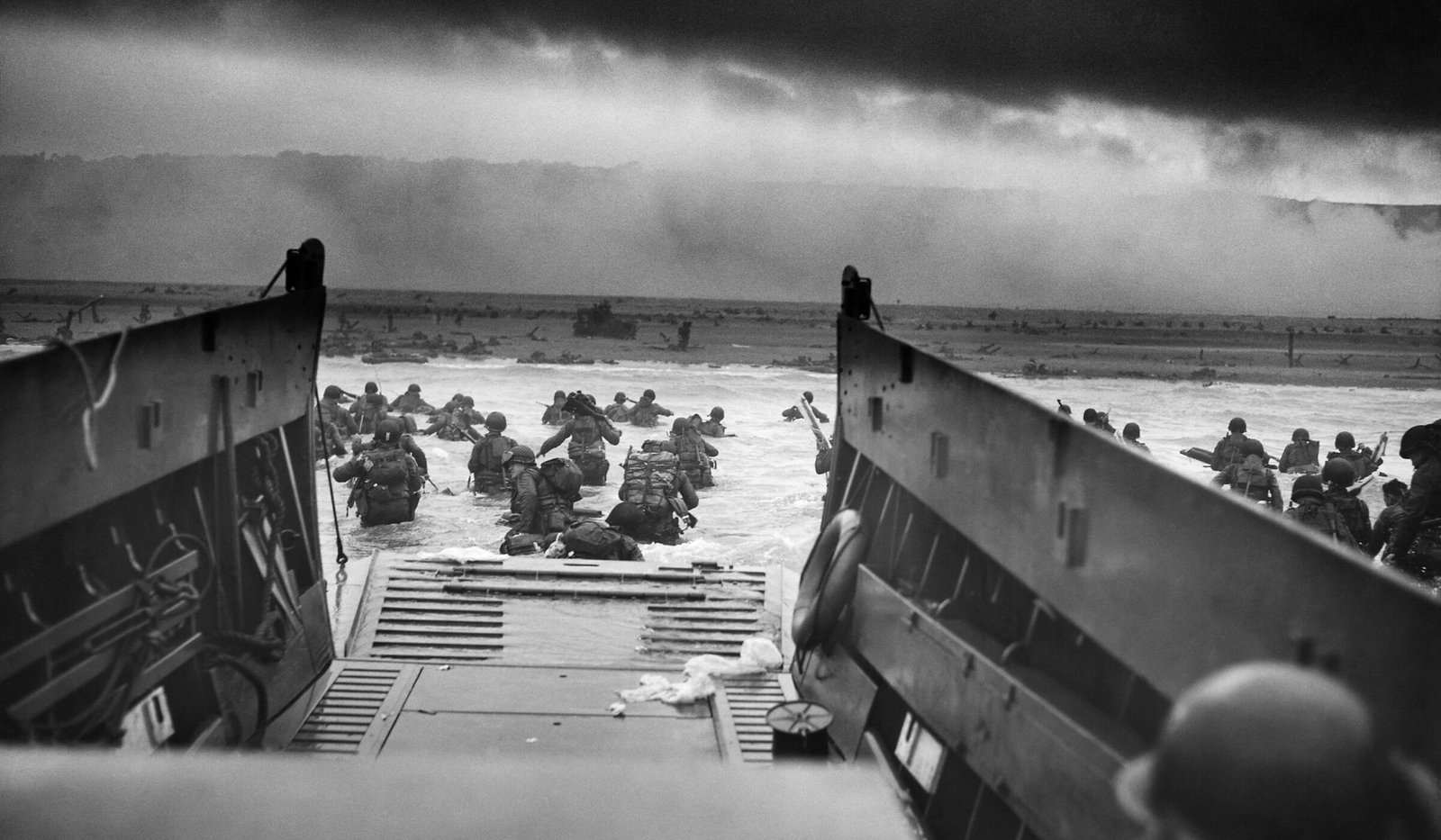 Troops of the 1st Infantry Division wade ashore at Omaha Beach, 6 June 1944