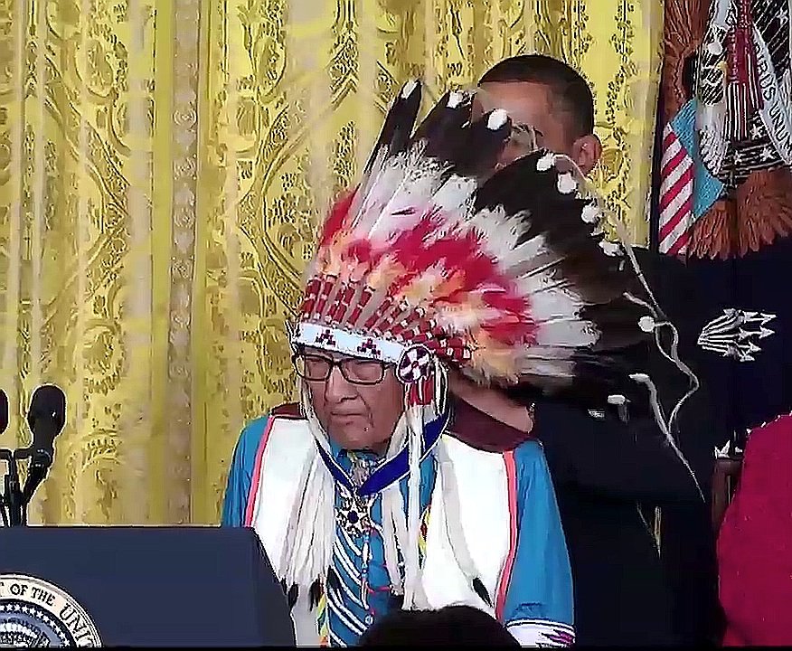 Joseph Medicine Crow with President Obama after receiving the Presidential Medal of Freedom, 12 August 2009