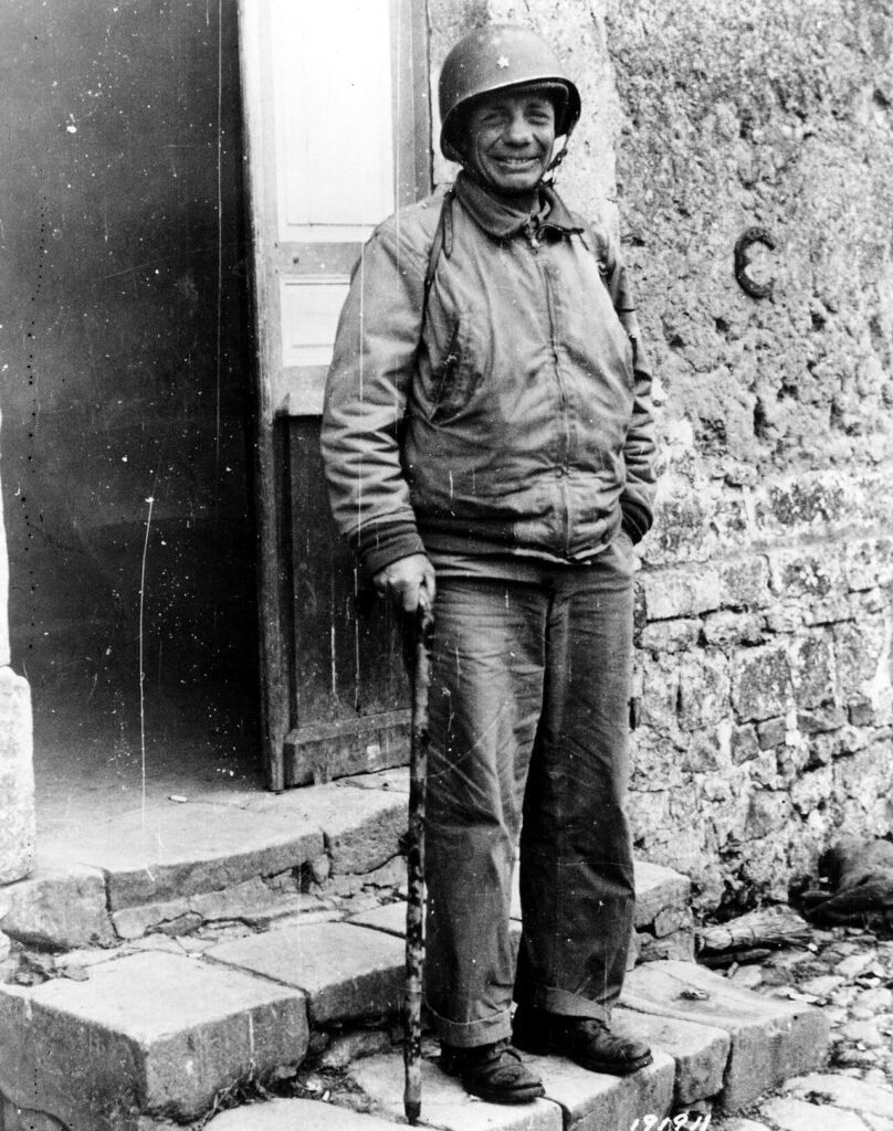 Brigadier General Theodore Roosevelt Jr. at the door of his command post near Sainte-Mère-Église on 12 July 1944, the day he died